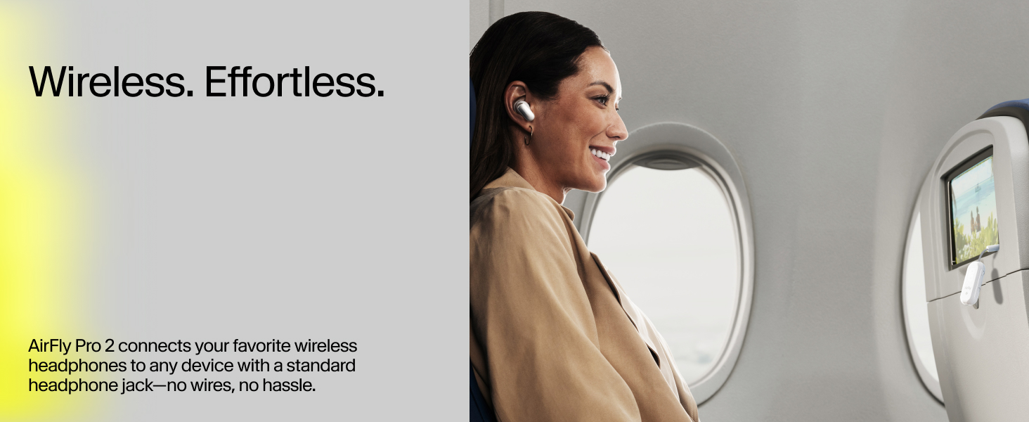 Woman on airplane using AirFly Pro 2 to watch in-flight screen with wireless earbuds