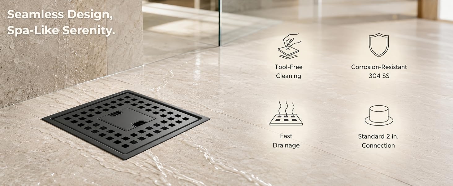 Matte black square shower drain installed in warm stone tile spa style walk in shower