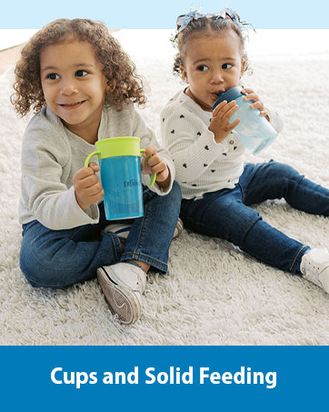 Toddler boy and girl drinking blue and green Straw to 360 Cup Set