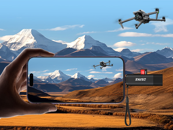 Drone photography sequence showing device flying over mountainous terrain against blue sky, capturing landscape views with snow-capped peaks.