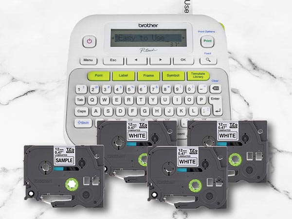 P-touch label maker on marble surface, with four included label tapes