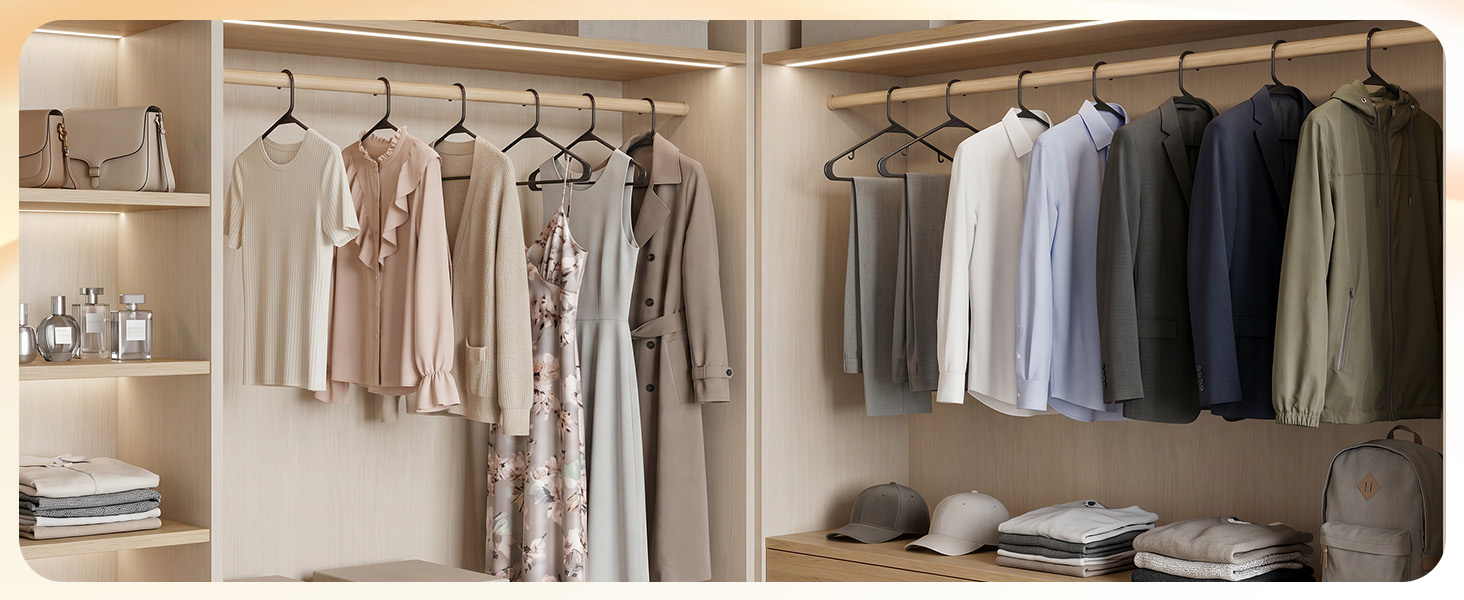 Open closet with black hangers holding shirts, jackets, and pants. Sleek uniform look