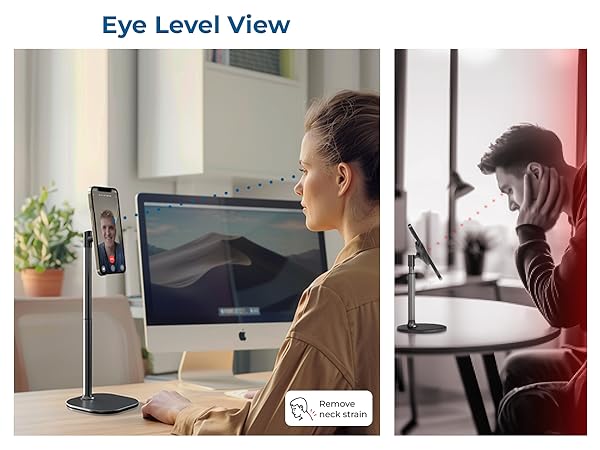 Phone mounting stand with 'Eye Level View' text, shown in use with desktop computer setup in office environment.