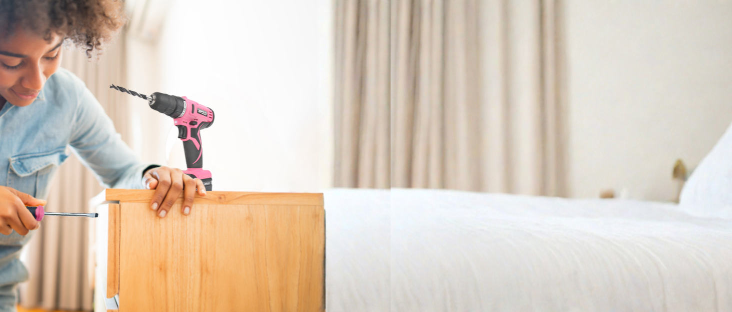 Young women assembling furniture with Apollo Tools Household tool kits