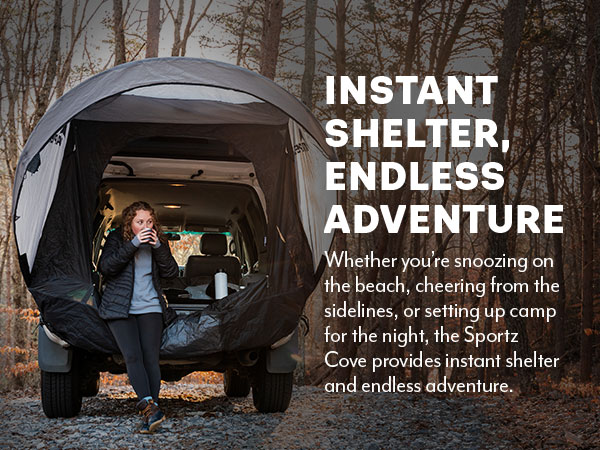 Napier Sportz Cove SUV tent with large awning and camper sipping coffee inside vehicle shelter