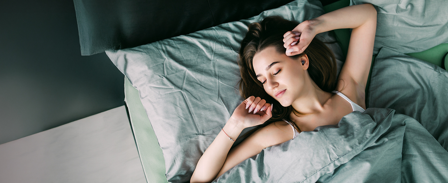 Series of grayscale lifestyle photos showing someone resting or sleeping in bed, demonstrating relaxation or sleep tracking functionality.