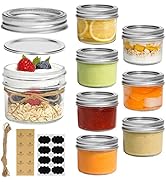 Set of glass mason jars with metal lids, containing various food items. Includes empty jars, jars with fruits, vegetables, and dry goods. Accessories like labels and string visible.