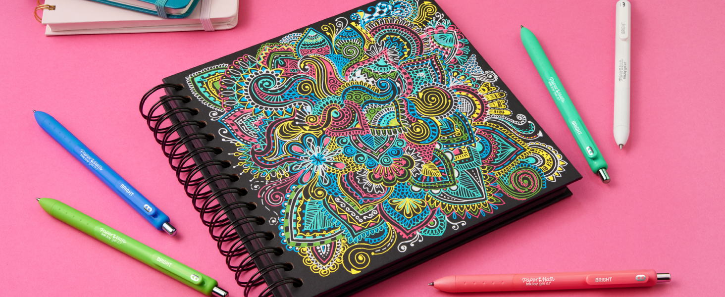 inkjoy gel bright colorful paper adult coloring light dark pop design pink background desk pen write