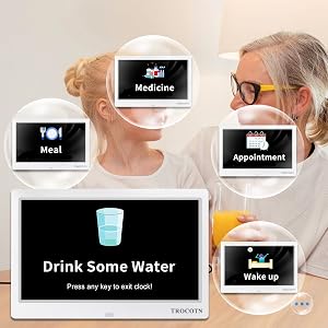 Digital interface displaying various health-related icons: Medicine, Meal, Appointment, and 'Wake up'. Central message reads 'Drink Some Water' with instruction to press any key.