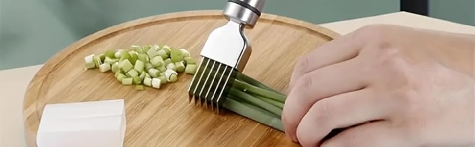A rustic wooden cutting board with scattered fresh herbs and vegetables, ready for preparation