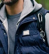 geekey multitool key hanging on keychain on backpack hiking in woods