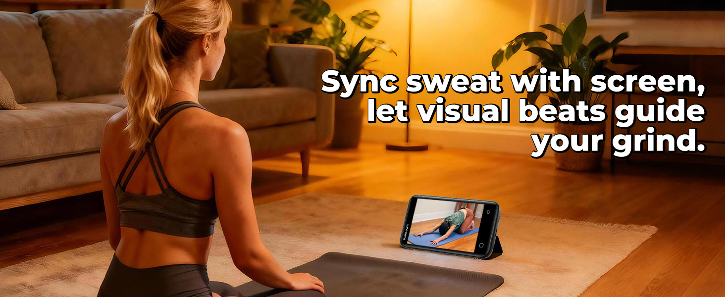 Woman doing a home workout while following an exercise video on an MP3 player screen.
