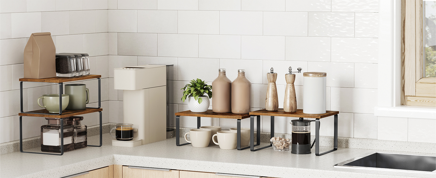 a kitchen counter with a coffee maker, a pot and a pot on it.