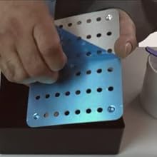Peel plastic from both sides of the plate