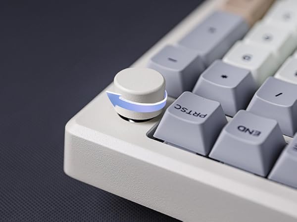a white keyboard with a blue light on it.