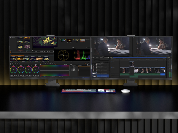 Complex video editing software interface displayed on a monitor, showing multiple panels with timelines, color correction tools, and video previews.