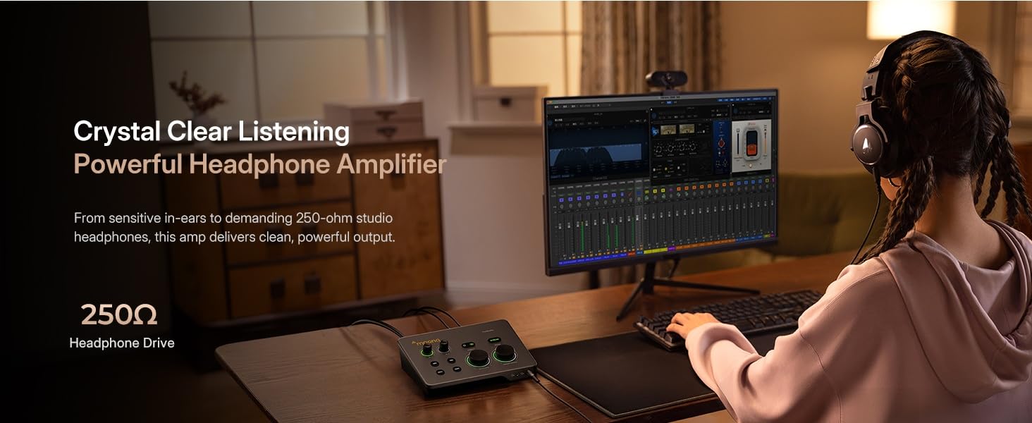 Content creator monitoring audio with studio headphones connected to Maono P2 audio interface