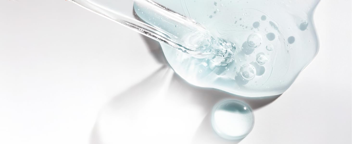 Abstract serum particle next to information related to Hyaluronic Serum and its benefits.