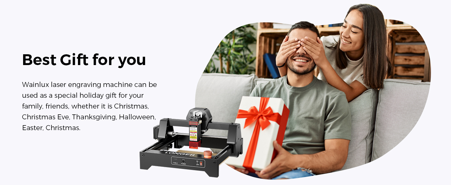 Laser engraving machine displayed next to image of person holding gift box. Machine features black frame with red accents and appears compact for desktop use.