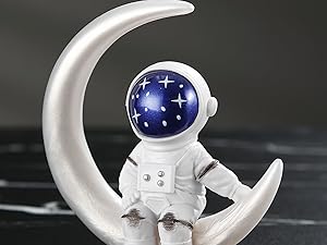 blue astronaut statues