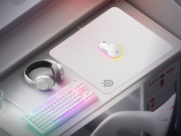 Desktop setup with a keyboard, mouse, headset, and mouse pad