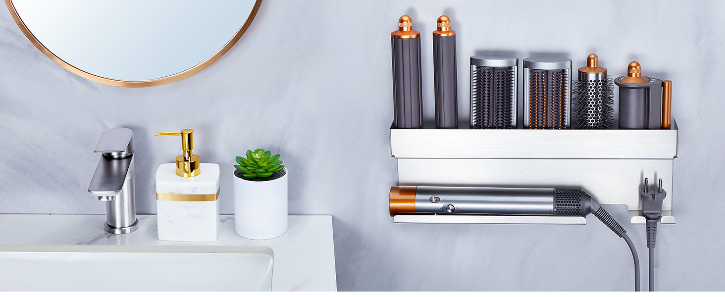 Modern bathroom organization system featuring mounted metal shelving units holding cosmetic products and accessories against white wall background.
