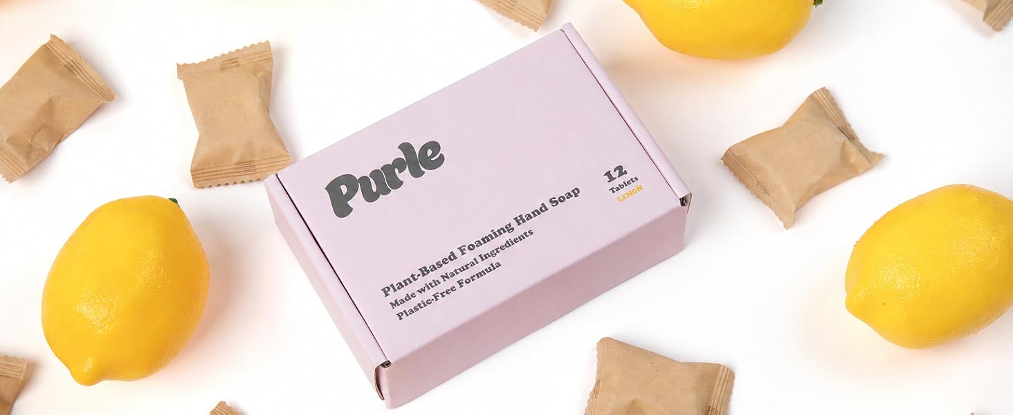 Purle foaming hand soap tablet, dispenser and packaging on marble countertop