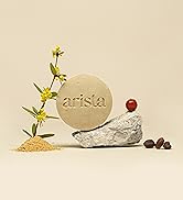 Arista’s natural ingredients oily hair shampoo bar balanced on natural stone
