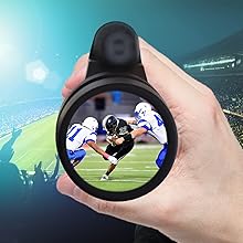 Enhanced image of football player catching the ball at a football stadium
