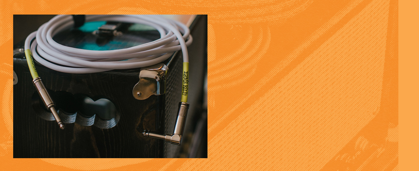 white guitar cable on amp