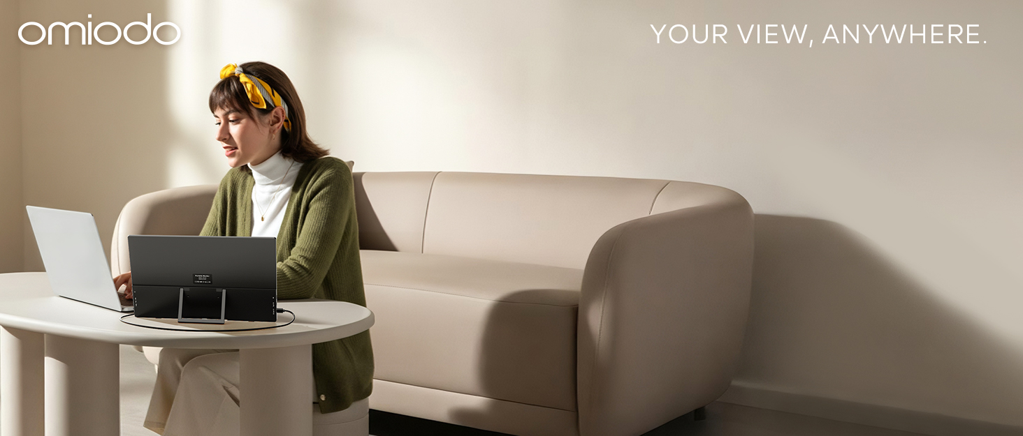 Text reads 'YOUR VIEW, ANYWHERE'. Interior scene showing modern living room with sofa and table arrangement.