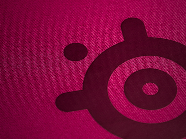 Closeup of mousepad micro-woven cloth fabric with SteelSeries logo