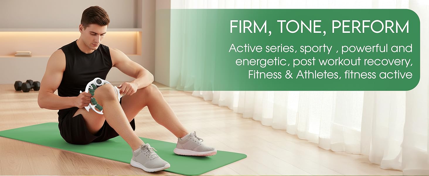 Athletic man using green massage roller for muscle relief post workout recovery