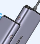 Metallic gray cylindrical device with a USB-C connector on one end and a pointed tip on the other. Likely an electronic stylus or pen.