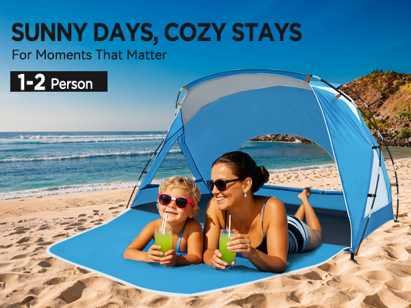 a mother and his kid are lying in a beach tent