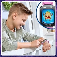 Kid presses screen buttons on DX4 to play exciting games like Monster Catcher and more.