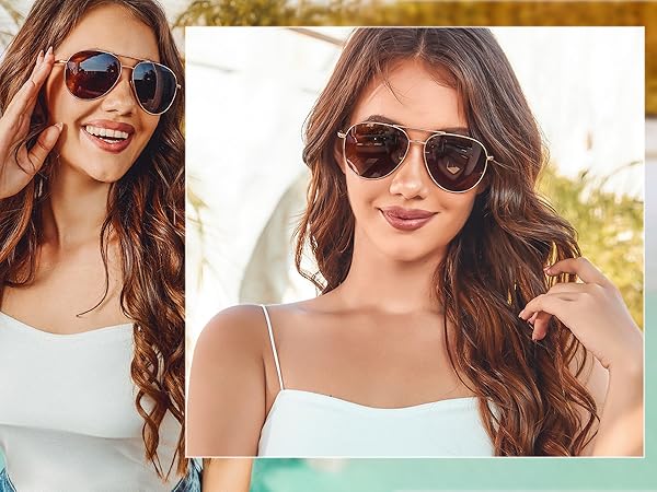 A stylish and elegant lady wearing copper-framed brown mirror glasses