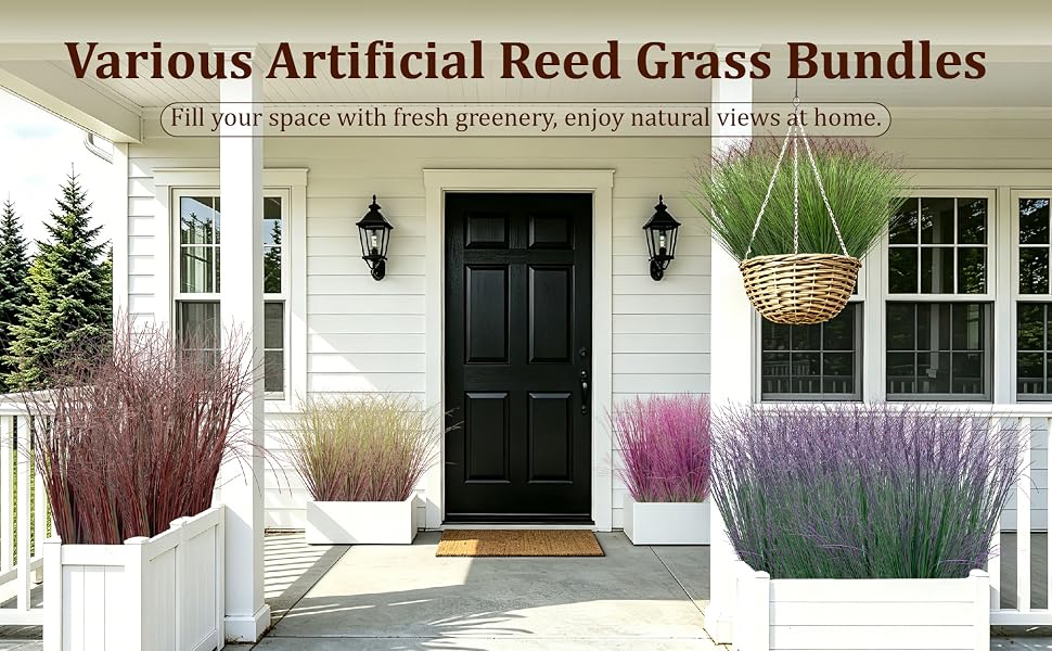 Assorted artificial reed grass bundles arranged on residential front porch