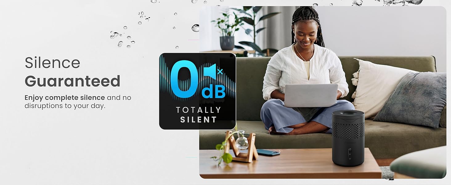 Advertisement for silent technology, showing person using laptop on couch. Text claims '0 dB Totally Silent' with graphic of sound wave.