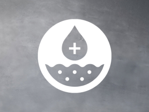 Liquid drop in white circle on dark grey background. 