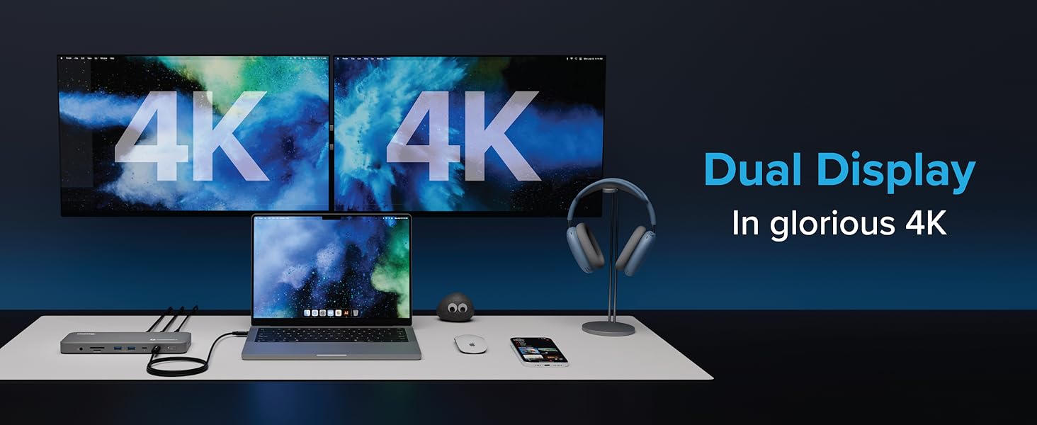 Dual 4K monitors and laptop connected via silver Plugable docking station for laptop