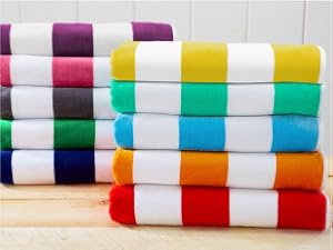 stack of beach towels in numerous colors