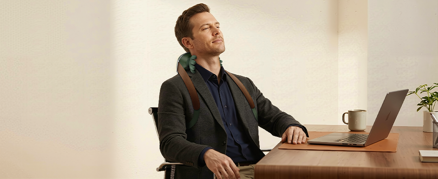 Office neck massager for desk workers man wearing portable neck massager while working