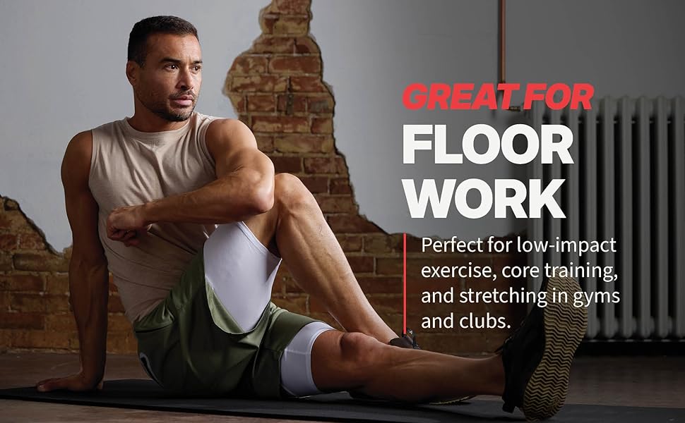 Man performing seated core exercise on SPRI mat highlighting comfort and support for floor workouts