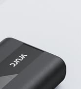 Close-up of a black electronic device corner, showing textured surface and 'Vinu' branding in white text.