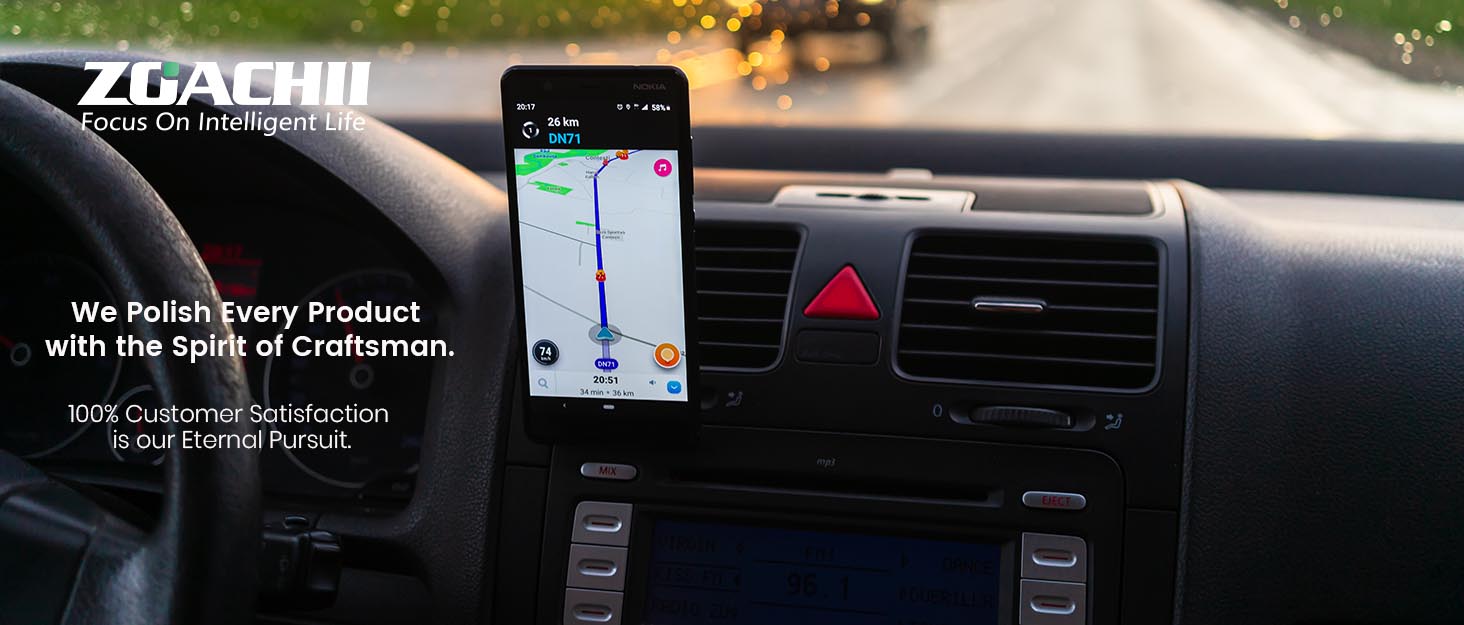 Car dashboard view showing smartphone mounted near air vent displaying navigation map, with modern vehicle interior visible.