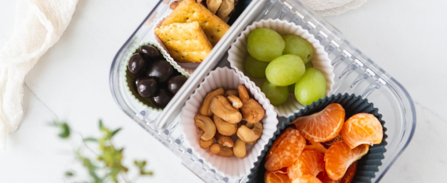 Snacks and fruit in a bento-style lunch box