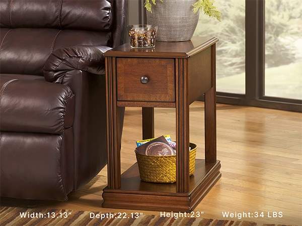 Living room seating area with narrow side table fitting snugly next to a brown leather recliner