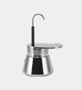 a small metal coffee pot with a black handle.