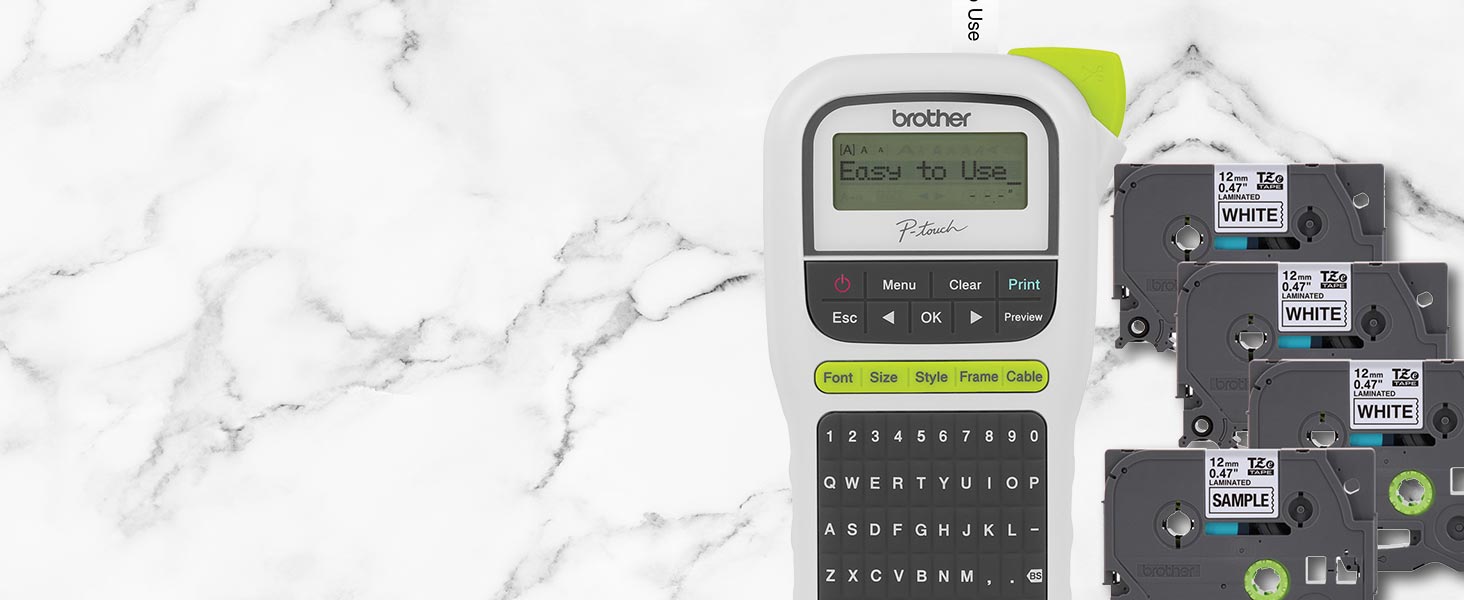 Label maker on marble surface, shown with four included label tapes